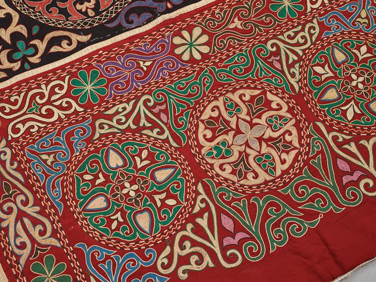 A Suzani textile, ca 247 x 128 cm.