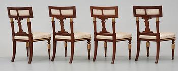 A Swedish late Gustavian-style seating circa 1900 (comprising four chairs, two armchairs, one sofa) and an Empire table.
