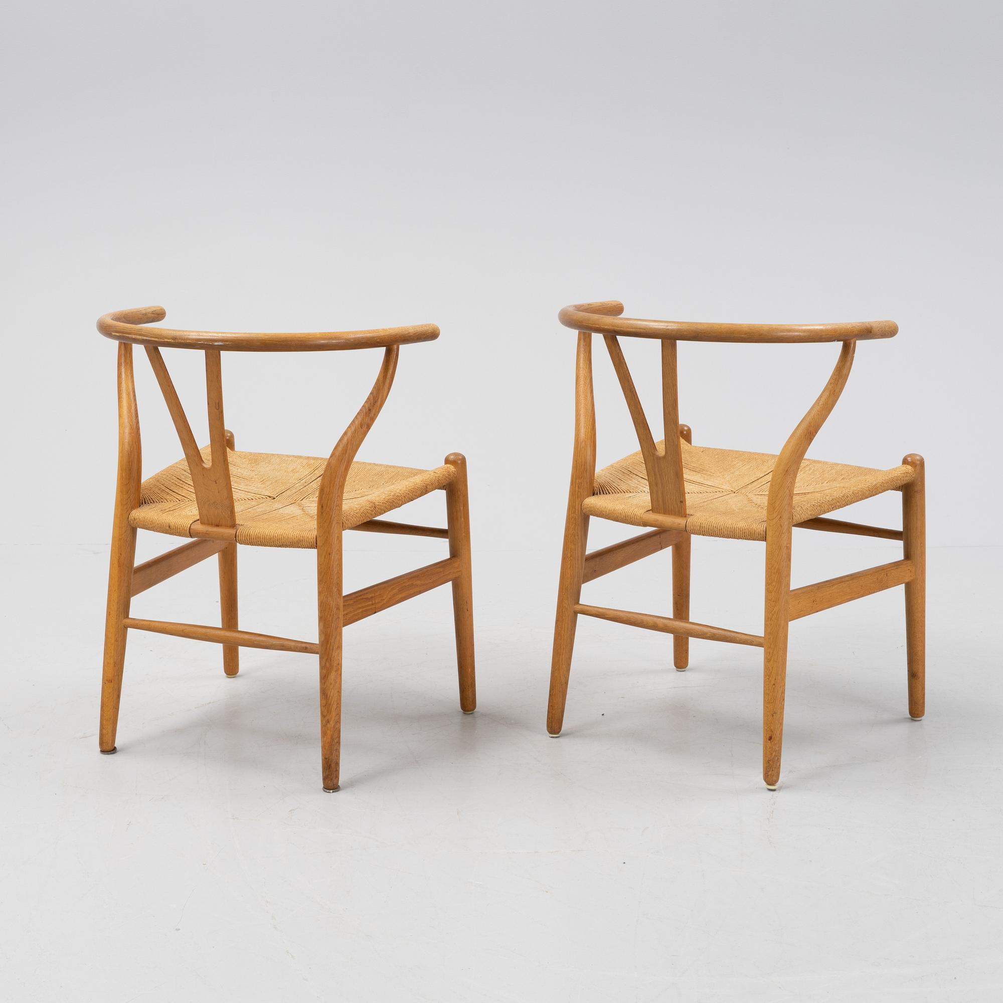 A pair of oak 'Y-chairs' by Hans J Wegner for Carl Hansen & Son, designed 1949.