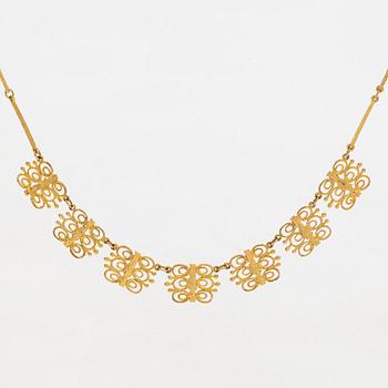 Esko Raitanen, collier, armband och örhängen, 14K guld, Helsingfors 1972.