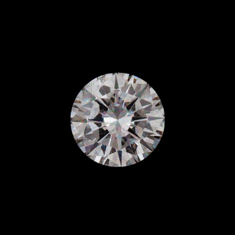 A loose diamond 1.01 cts. H/SI1 according to certificate from goldsmith.
