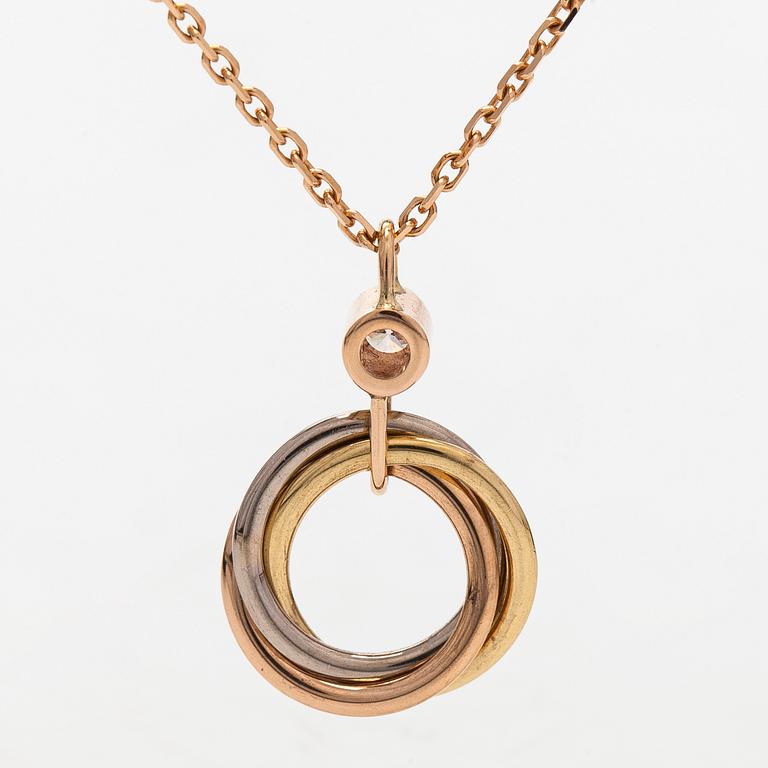 Cartier, halsband, "Trinity Pendant", 18K guld och en briljantslipad diamant.
