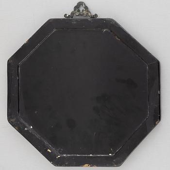 Four black-lacquered wall decorations, China, around 1900.