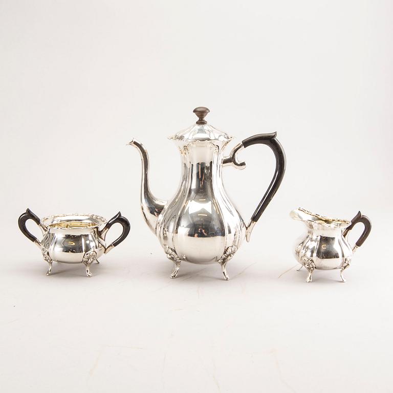 A 20th century German three parts silver tea service with Swedish import stamps.