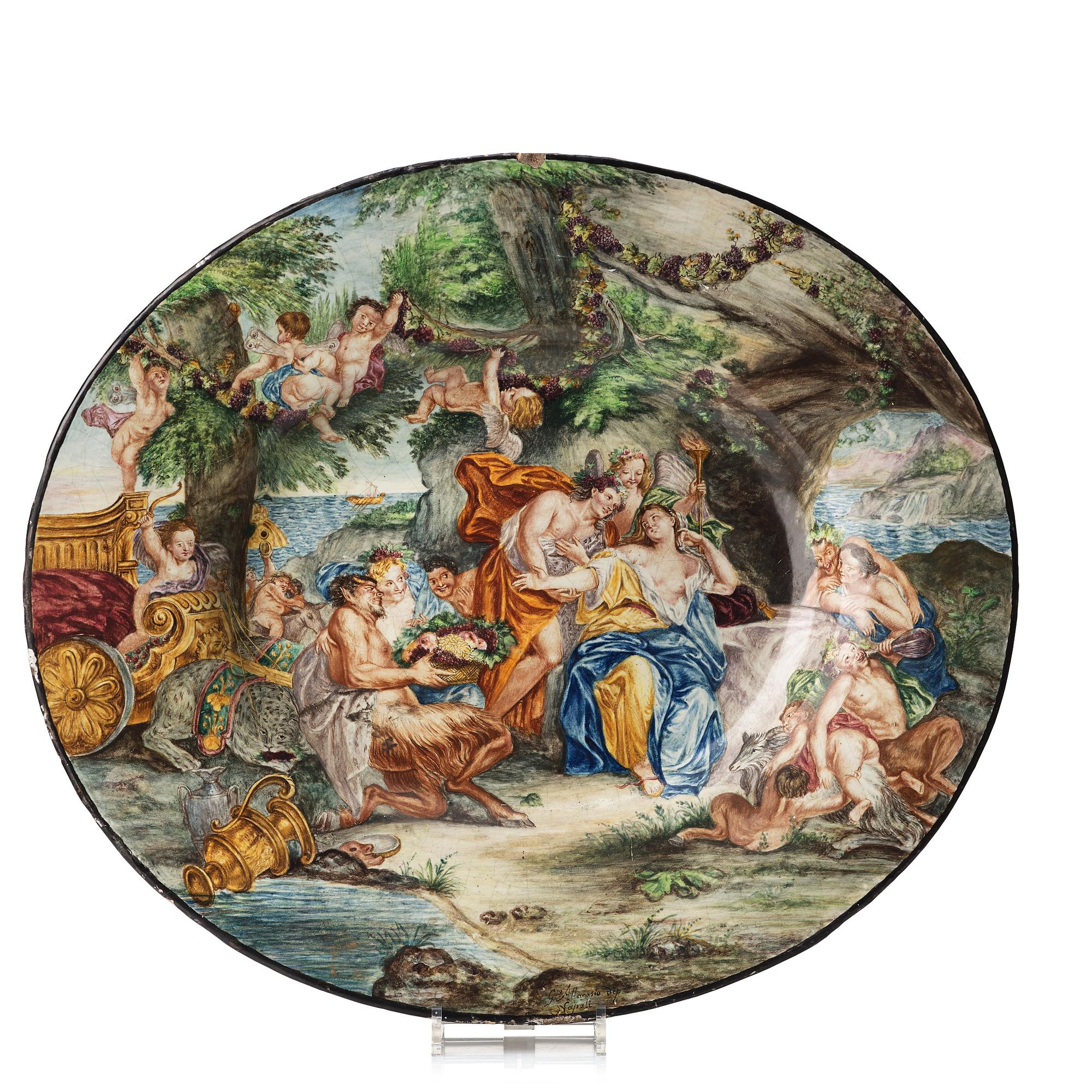 An Italian 'Istoriato' charger, 19th Century. Signed G Attanasio dip Napoli. (piatto di pompa).