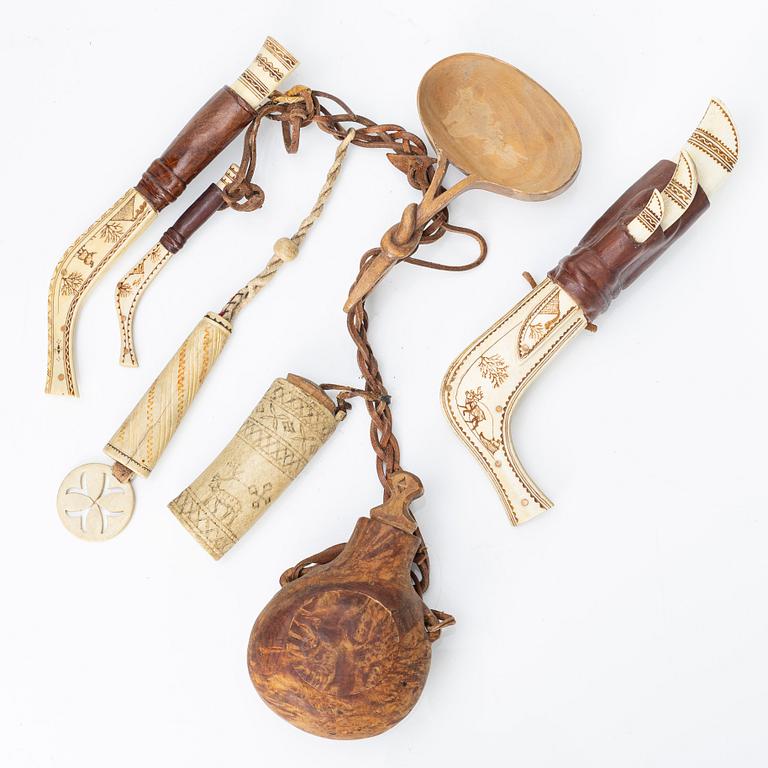 Half-horn knives, cup, bottle, needle case.