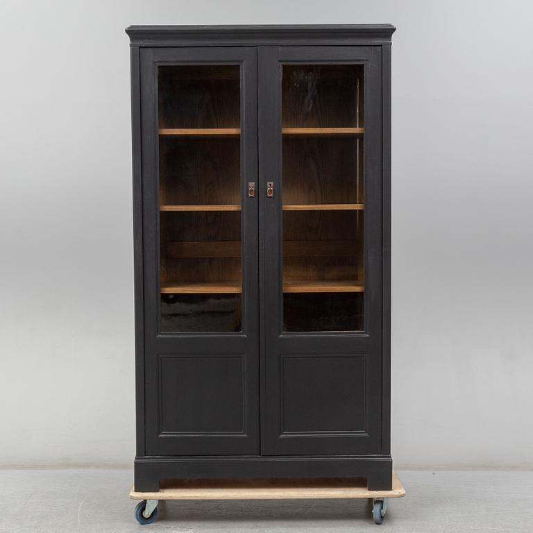 An early 20th century painted display cabinet.