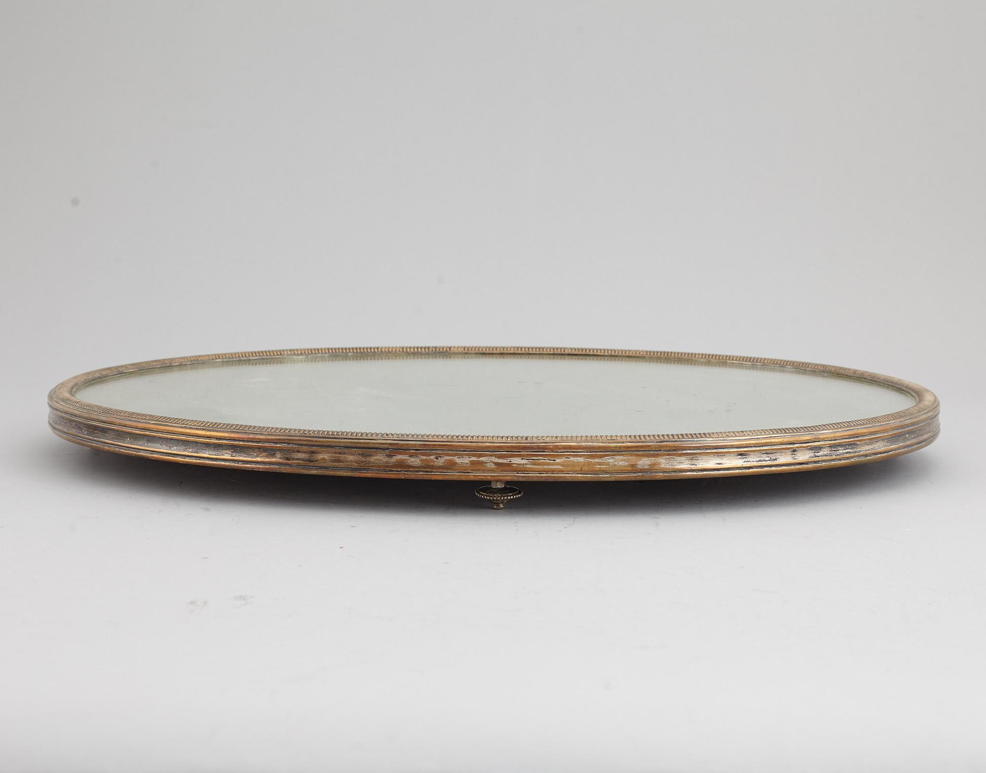 A argent hache table top, England, circa 1900.
