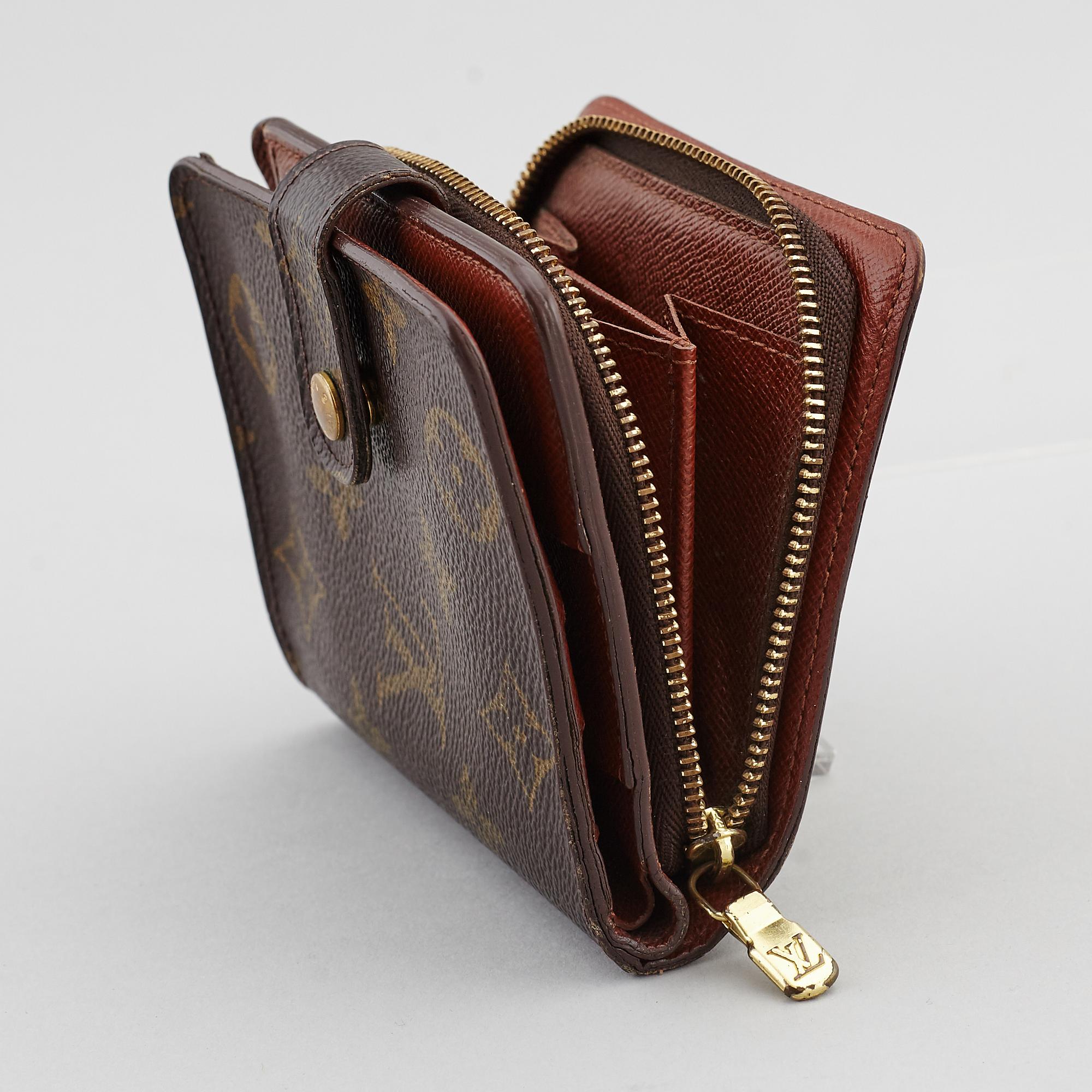 LOUIS VUITTON, a monogram canvas wallet.