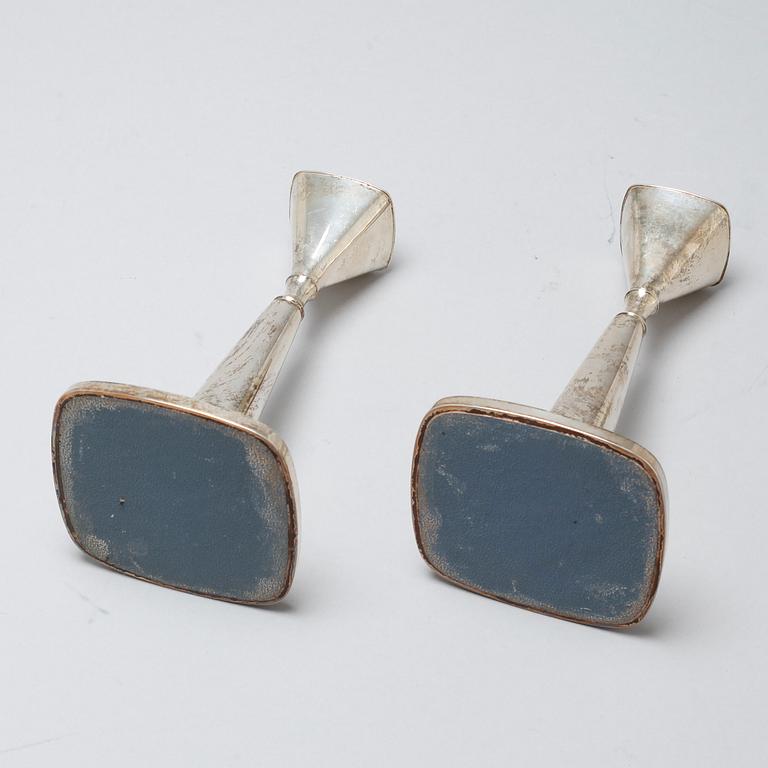 A pair of candlesticks by Thore Eldh for K&EC in Göteborg, 1960s.