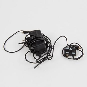 A "Sega Mega Drive" and nine games, 1990.s.