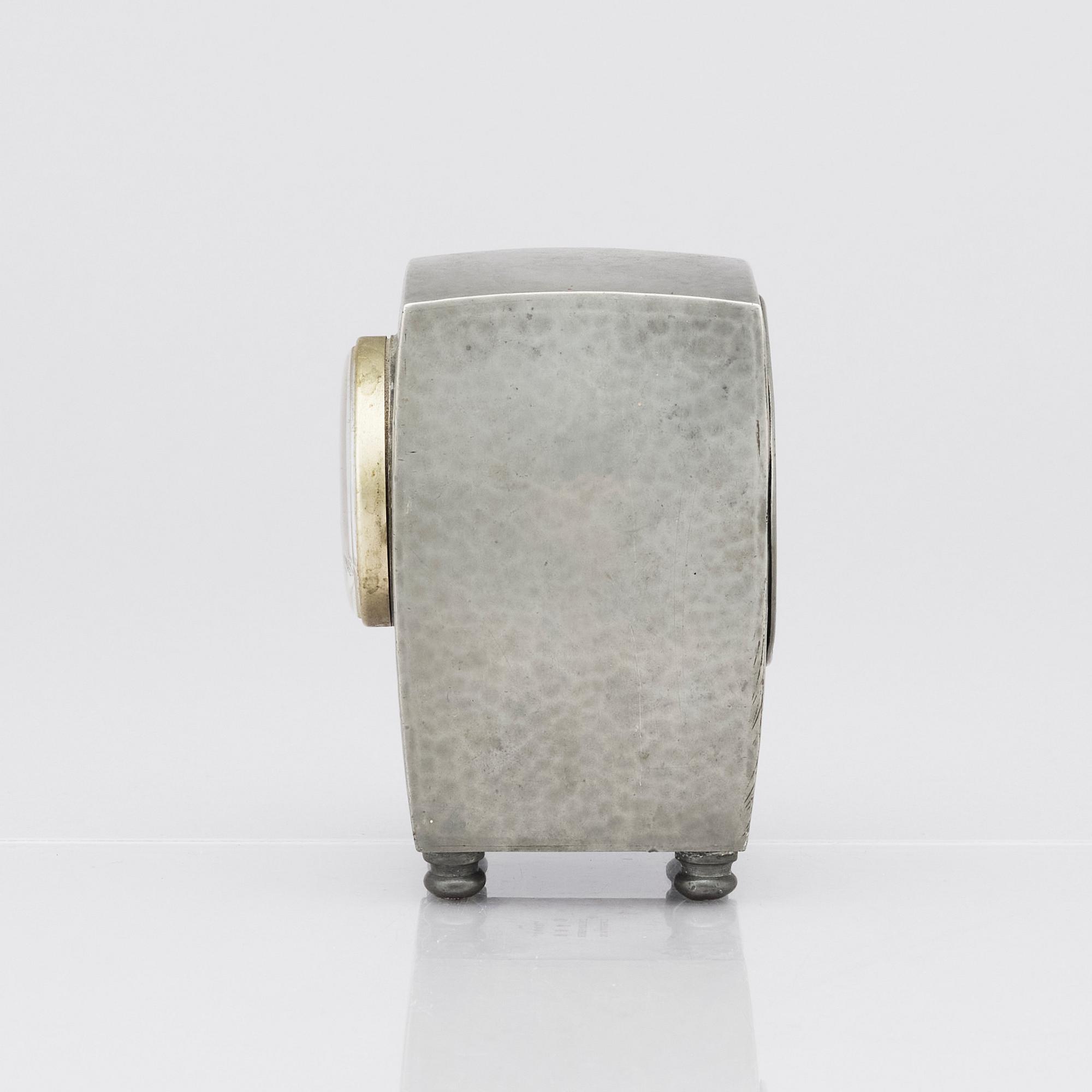 An Arts & Crafts Liberty & Co Tudric pewter and enamel timepiece, model no.0756.