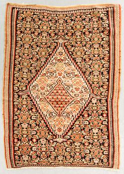 A semiantique Senneh carpet ca 159 x 106 cm.