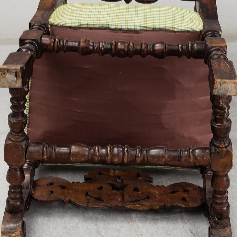 An 18th century baroque armchair.