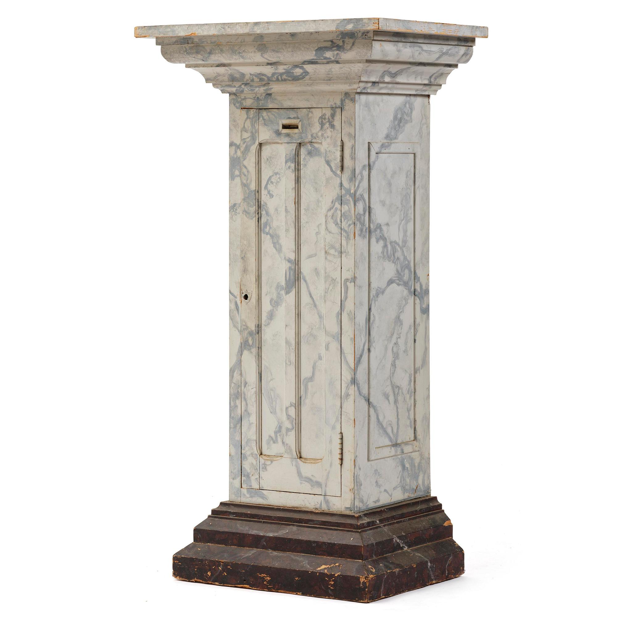 A Swedish column-shaped cabinet late 19 th century.