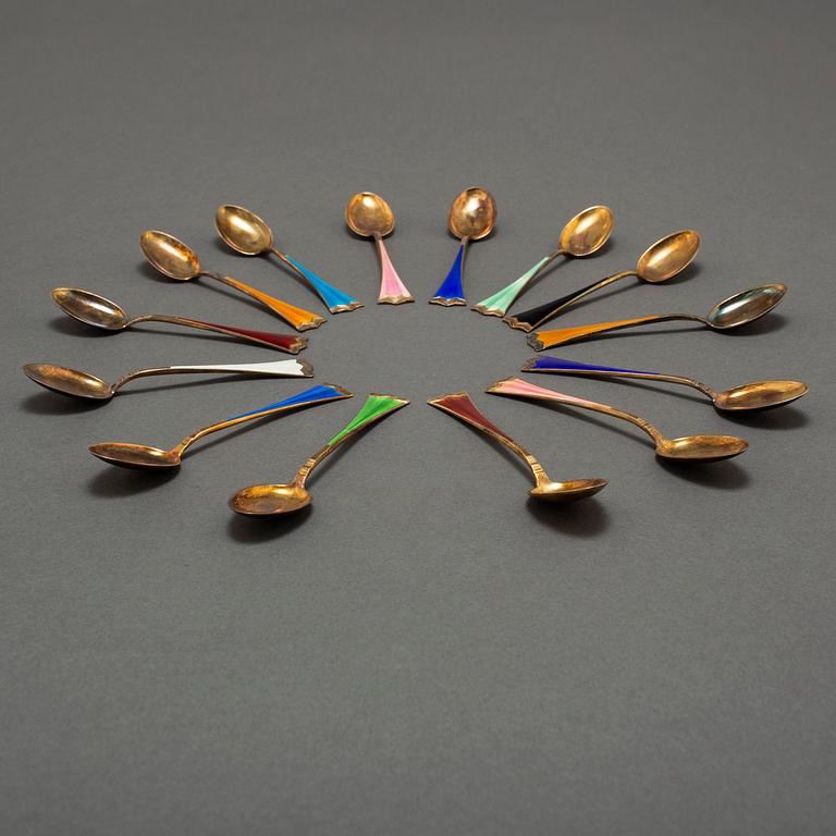 J TOSTRUP, 14 silver gilt and enamel coffee stoons from Oslo, Norway.