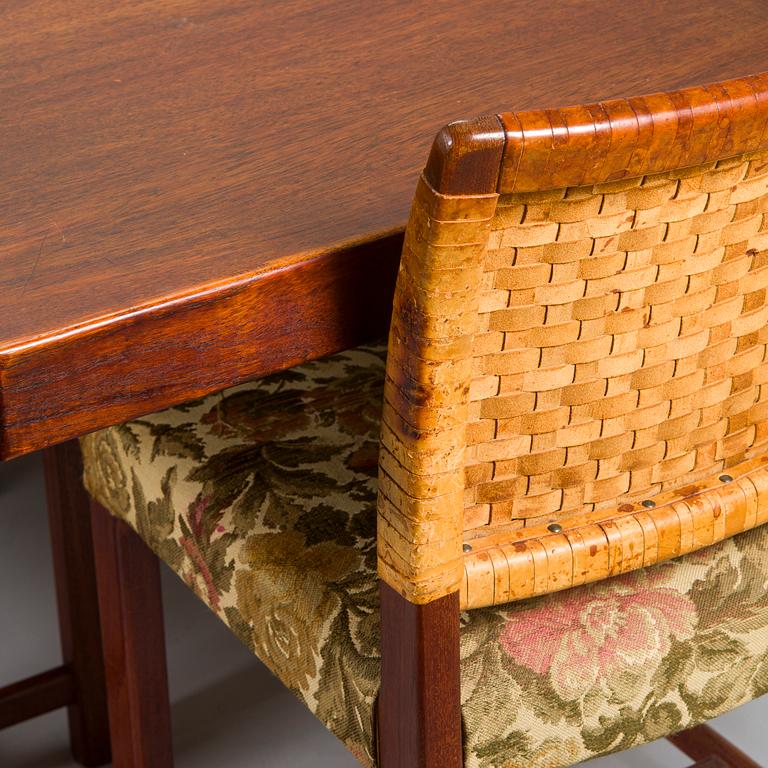 Carl Gustaf Hiort af Ornäs, a mid-20th-century 'Näyttely Senior' dining table and 12 chairs for HMN Huonekalu Nupponen.