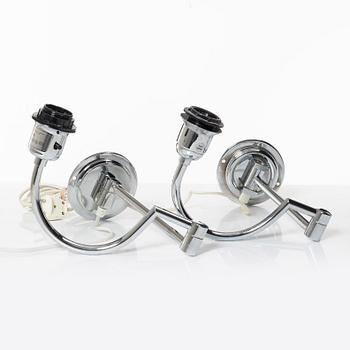 A pair of wall lamps EVÅ end of the 20th century.