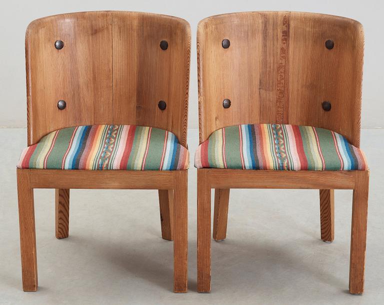 A pair of Axel Einar Hjorth 'Lovö' stained pine armchairs, Nordiska Kompaniet, 1930's.