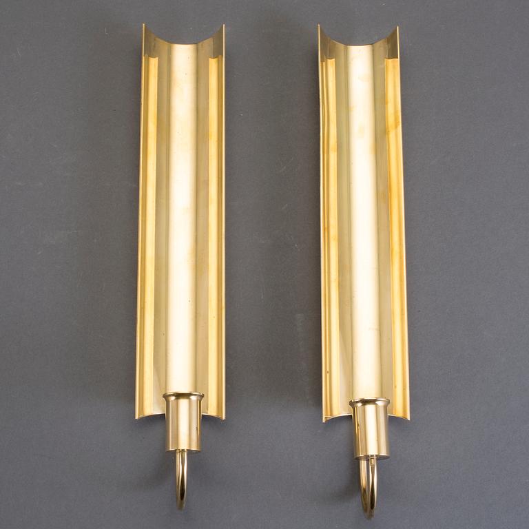 VÄGGLJUSSTAKAR, ett par, mässing, "Reflex", Pierre Forsell, Skultuna.