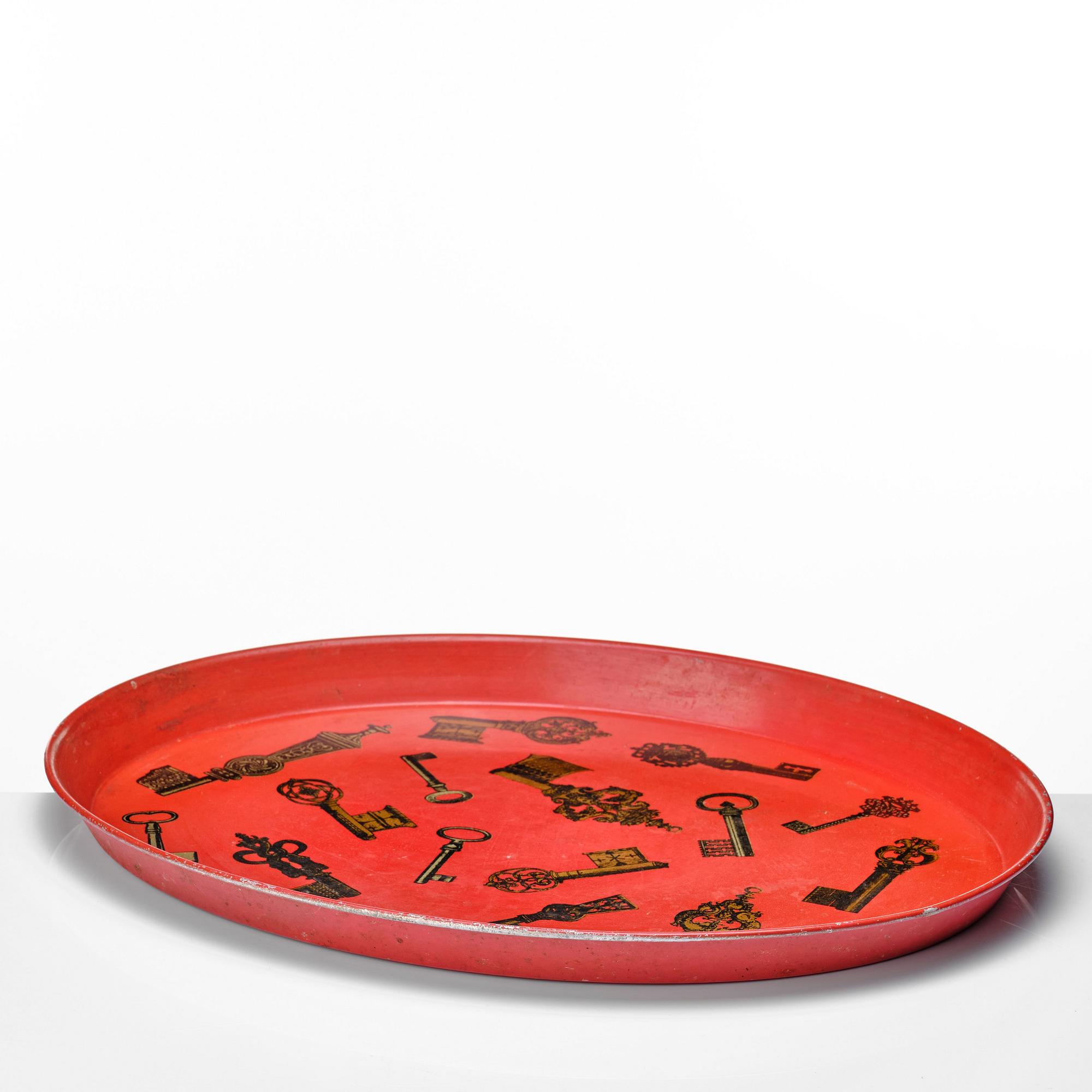 Piero Fornasetti, an oval printed and lacquered sheet metal tray, Milan, Italy, probably 1960's.