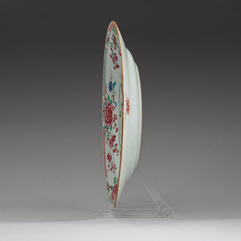 A famille rose 'double peacock' serving dish, Qing dynasty, Qianlong (1736-95).