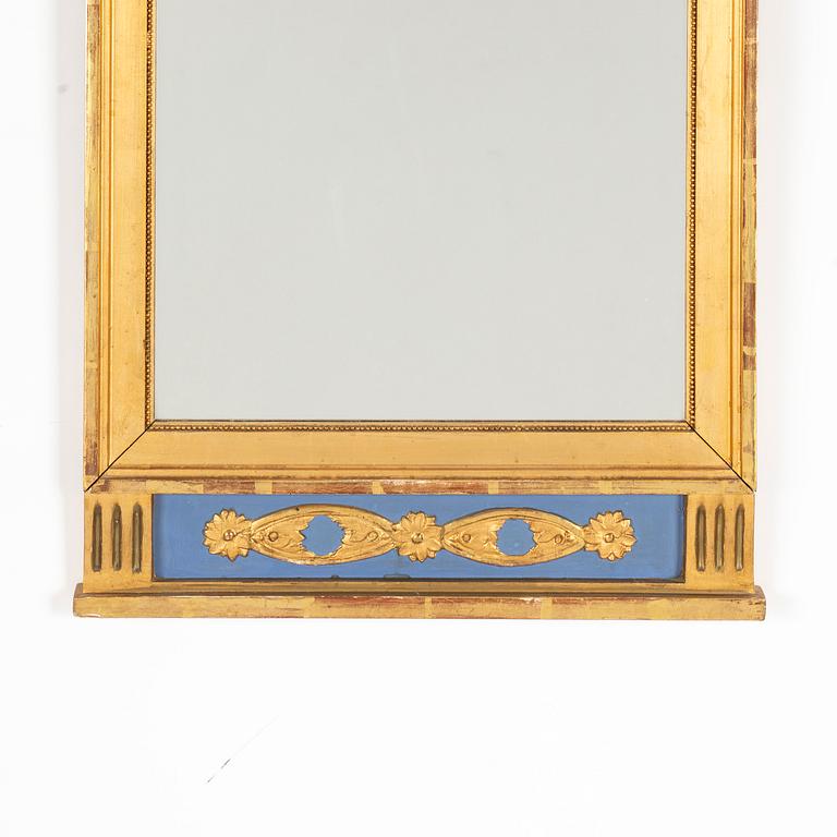 A Gustavian style mirror, mid 20th century.