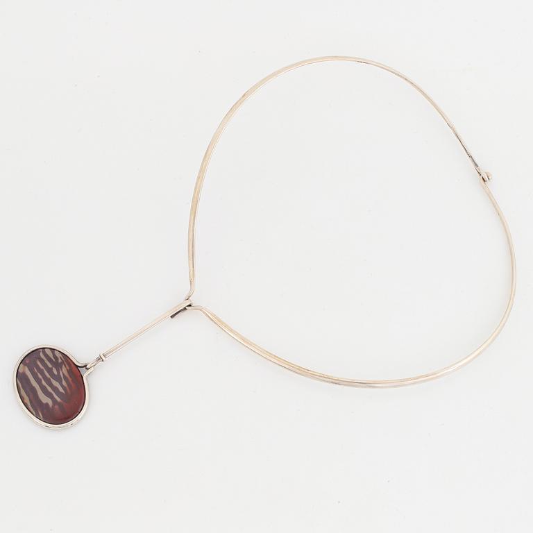 Vivianna Torun Bülow Hübe, a sterling choker with a pendant, Jakarta Indonesia.