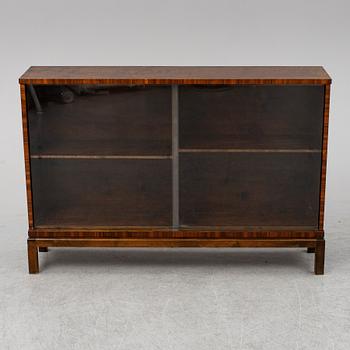 A stained birch veneered bookcase, 1930's.