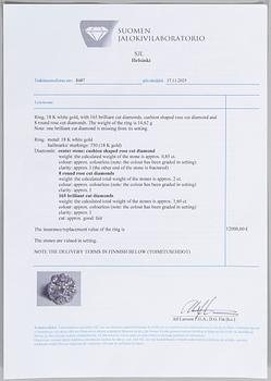 An 18K white gold ring set with rose-cut and brilliant-cut diamonds.