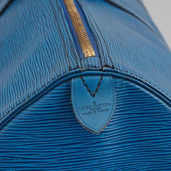LOUIS VUITTON, a 'Keepall 55 Epi' weekendbag.