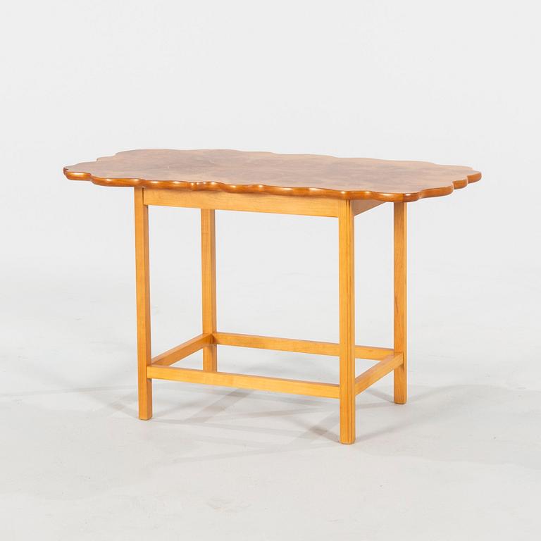 A Josef Frank 1058 cherry wood and elm root side table.