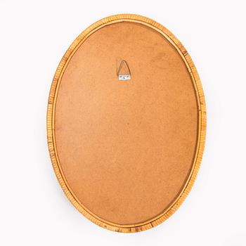 Mirror, rattan-covered frame, 1950s.