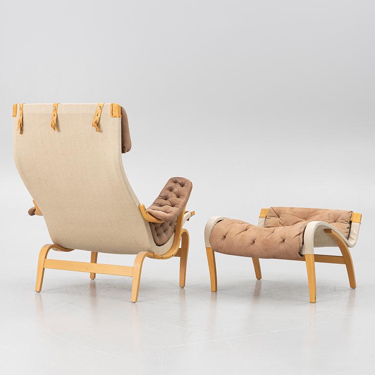Bruno Mathsson, a 'Pernilla' armchair and ottoman, Dux.