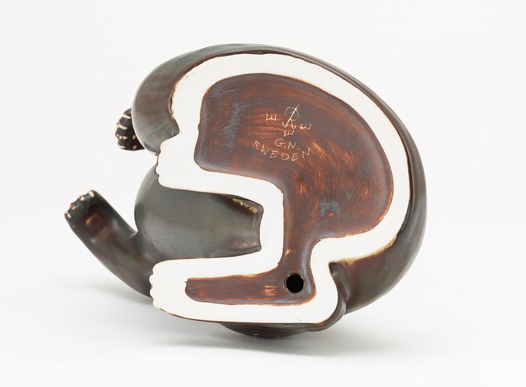 A Gunnar Nylund stoneware figure of a mustelids, Rörstrand.