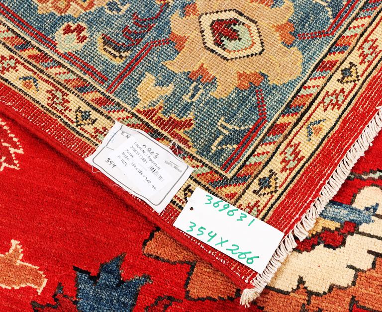 A Kazak carpet, c. 354 x 266 cm.