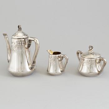 A Swedish Art Nouveau three piece parcel-gilt and silver coffee service, maker's mark CG Hallberg, Stockholm 1911-12.