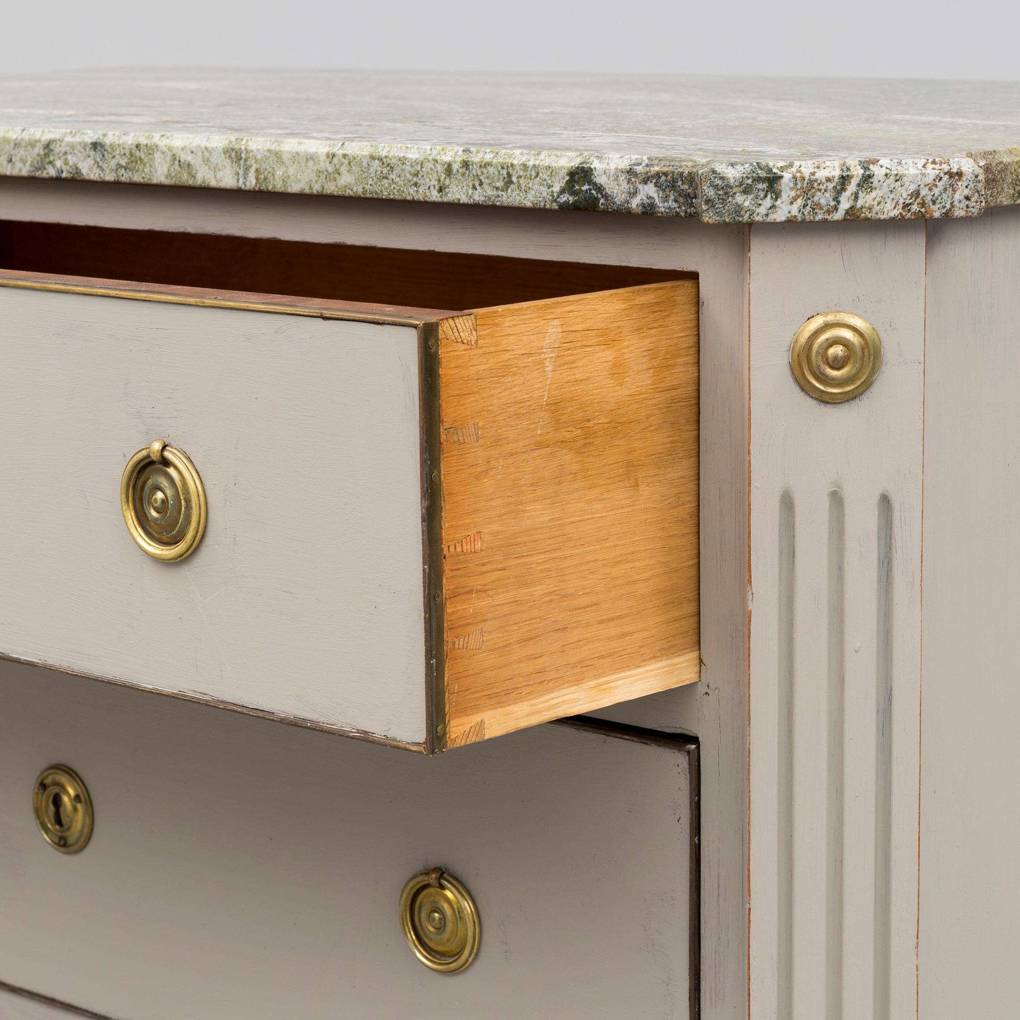 an early 20th century chest of drawers.