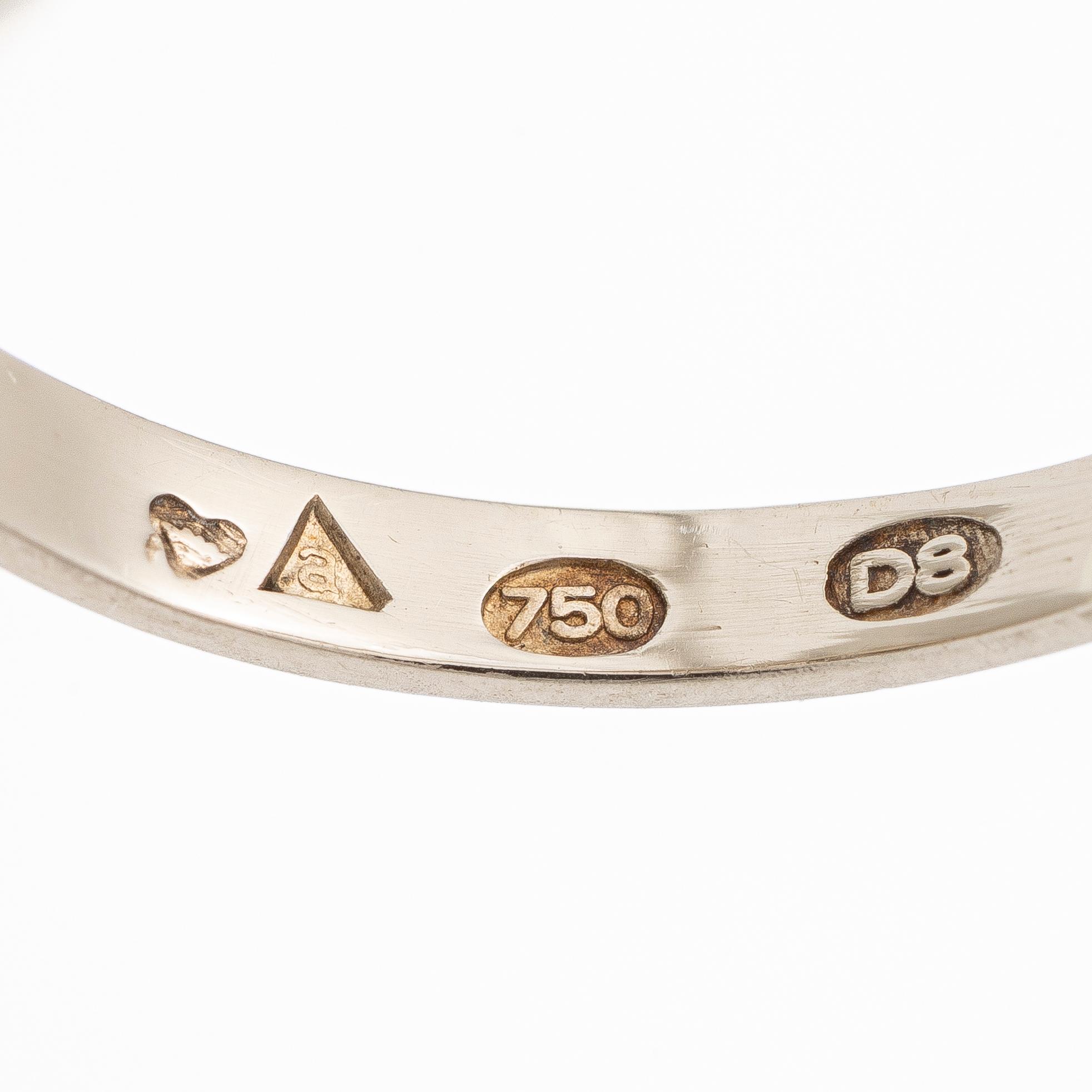 18K white gold ring set with brilliant-cut and single-cut diamonds, A. Koru 1981.