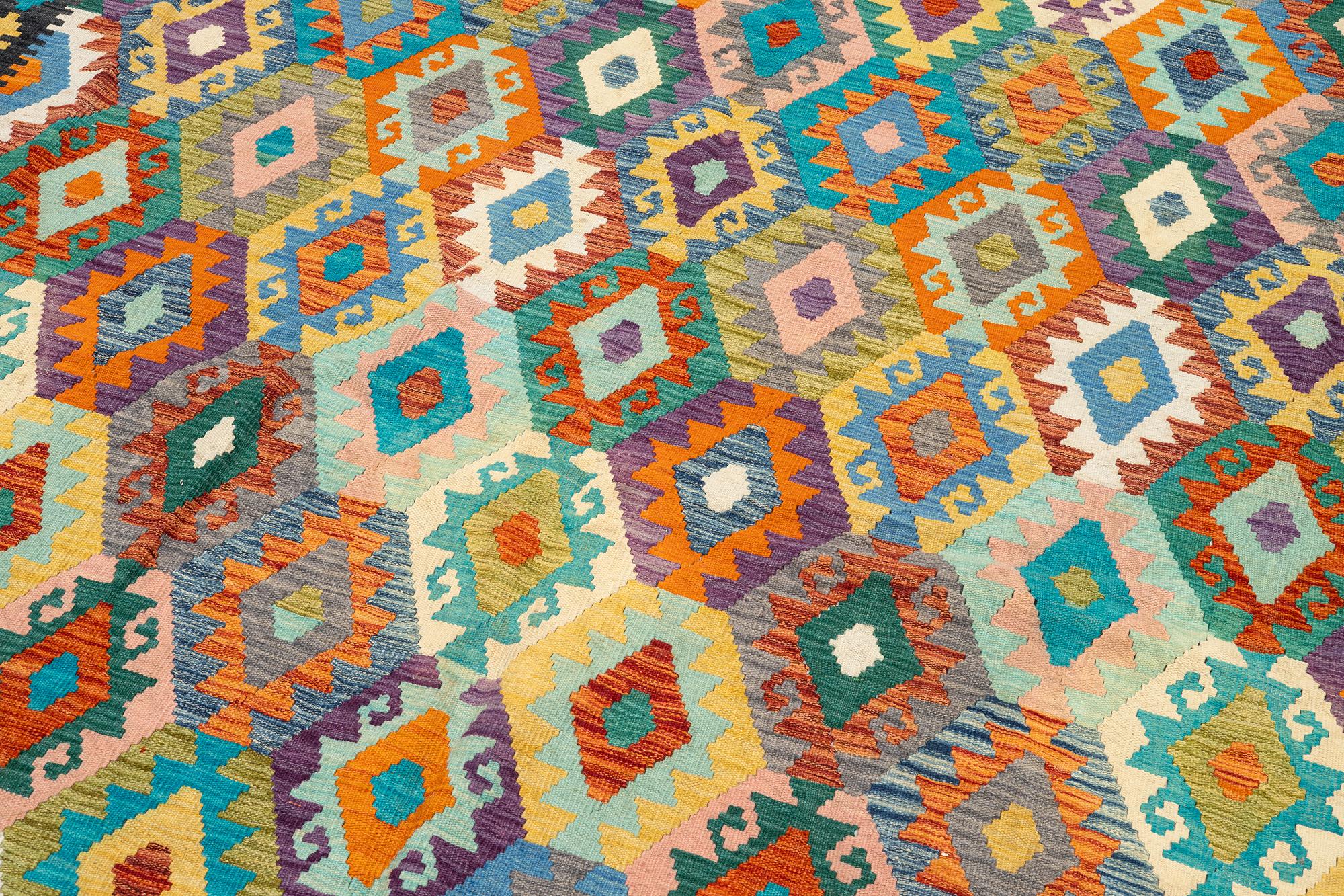 An, Afghan kilim carpet, c. 496 x 319 cm.