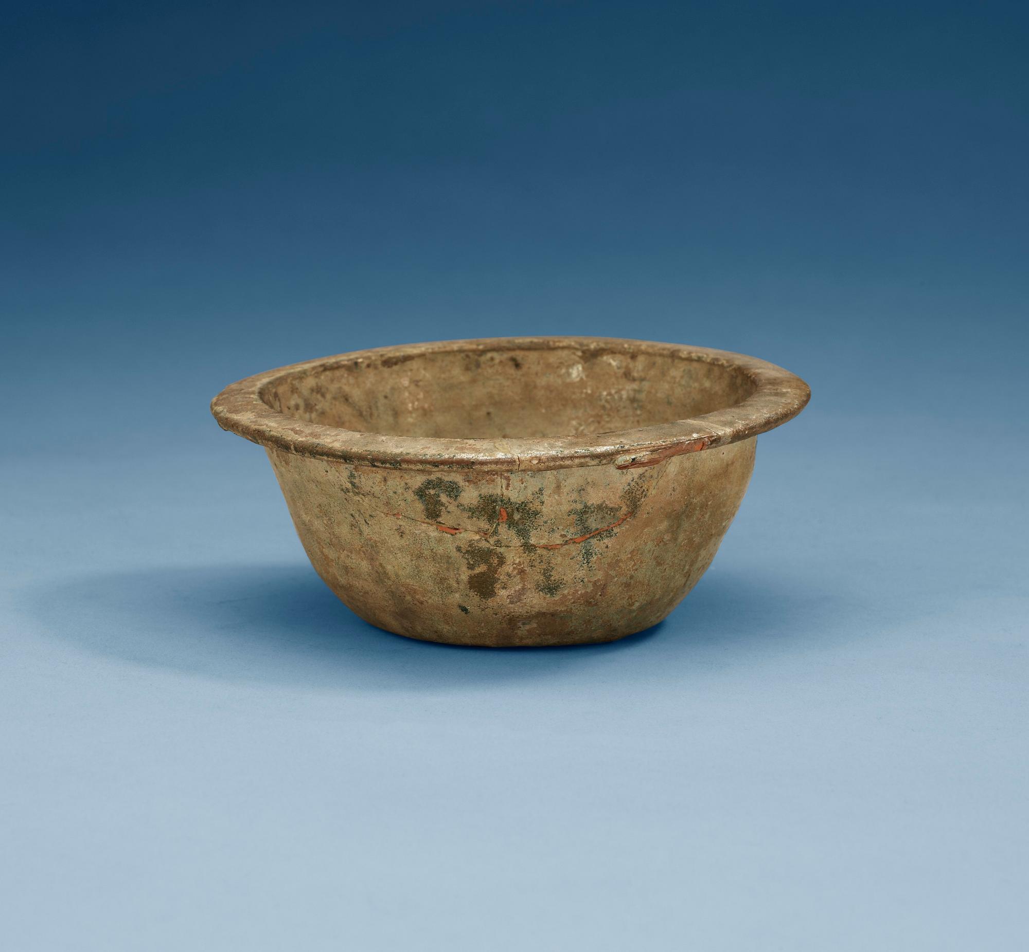 A green glazed bowl, Han dynasty (206 BC – 220 AD).