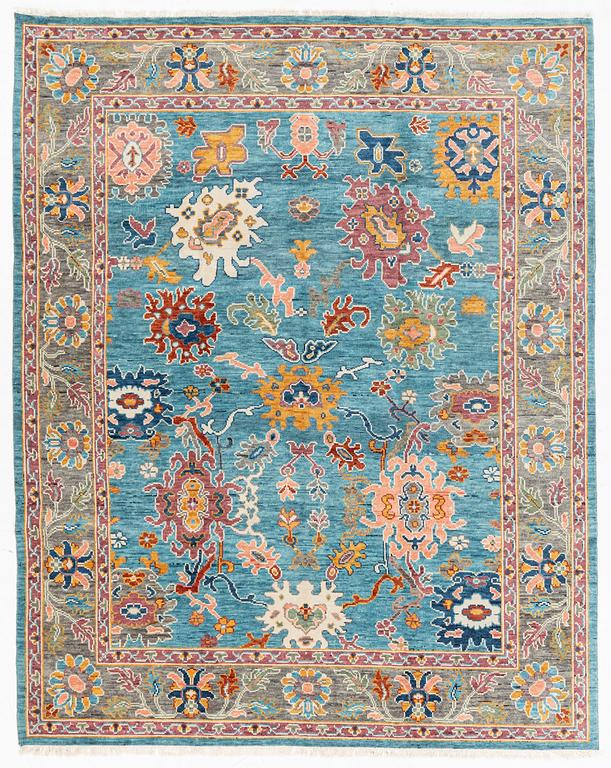 A Heriz design carpet, c. 301 x 240 cm.