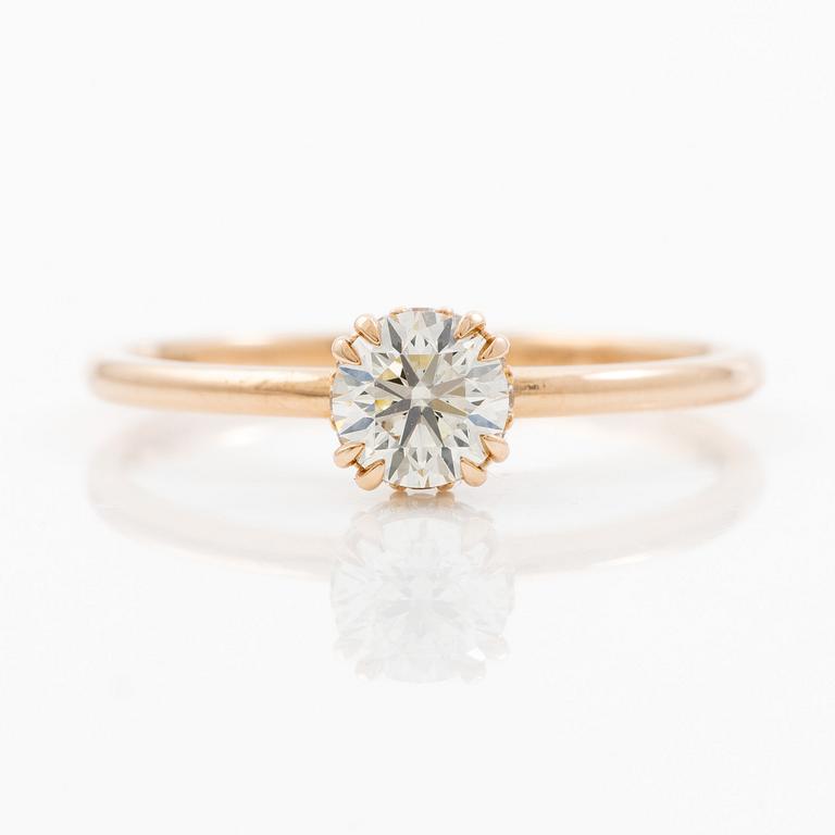 Ring 14K guld med briljantslipade diamanter.