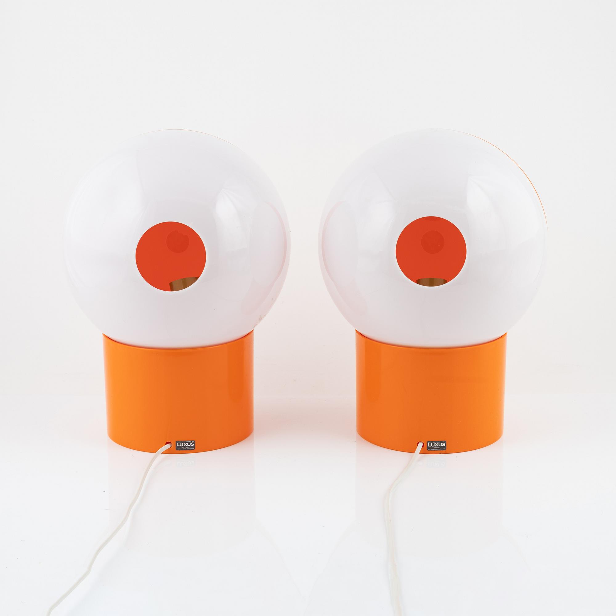 Uno & Östen Kristiansson, a pair of orance plastic 'Luno' model 1241 table lights, Luxus, Vittsjö.