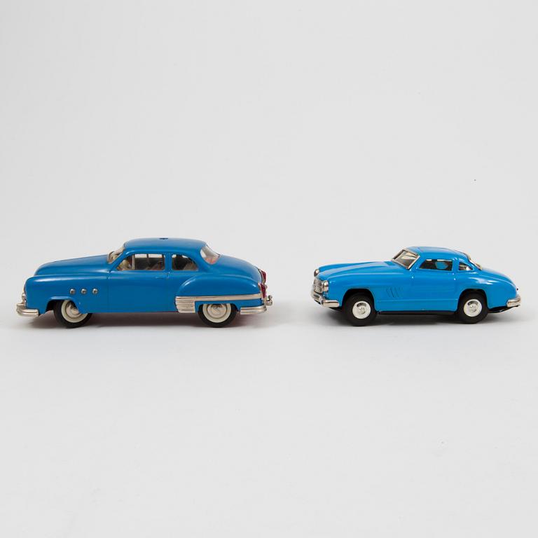 Two tinplate cars by Schuco and Kato Sairen German and Japan 1950s.