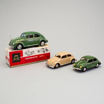 A lot of three Volkswagen sedan by various makers including Bandai and Arnold, 1950/60s.