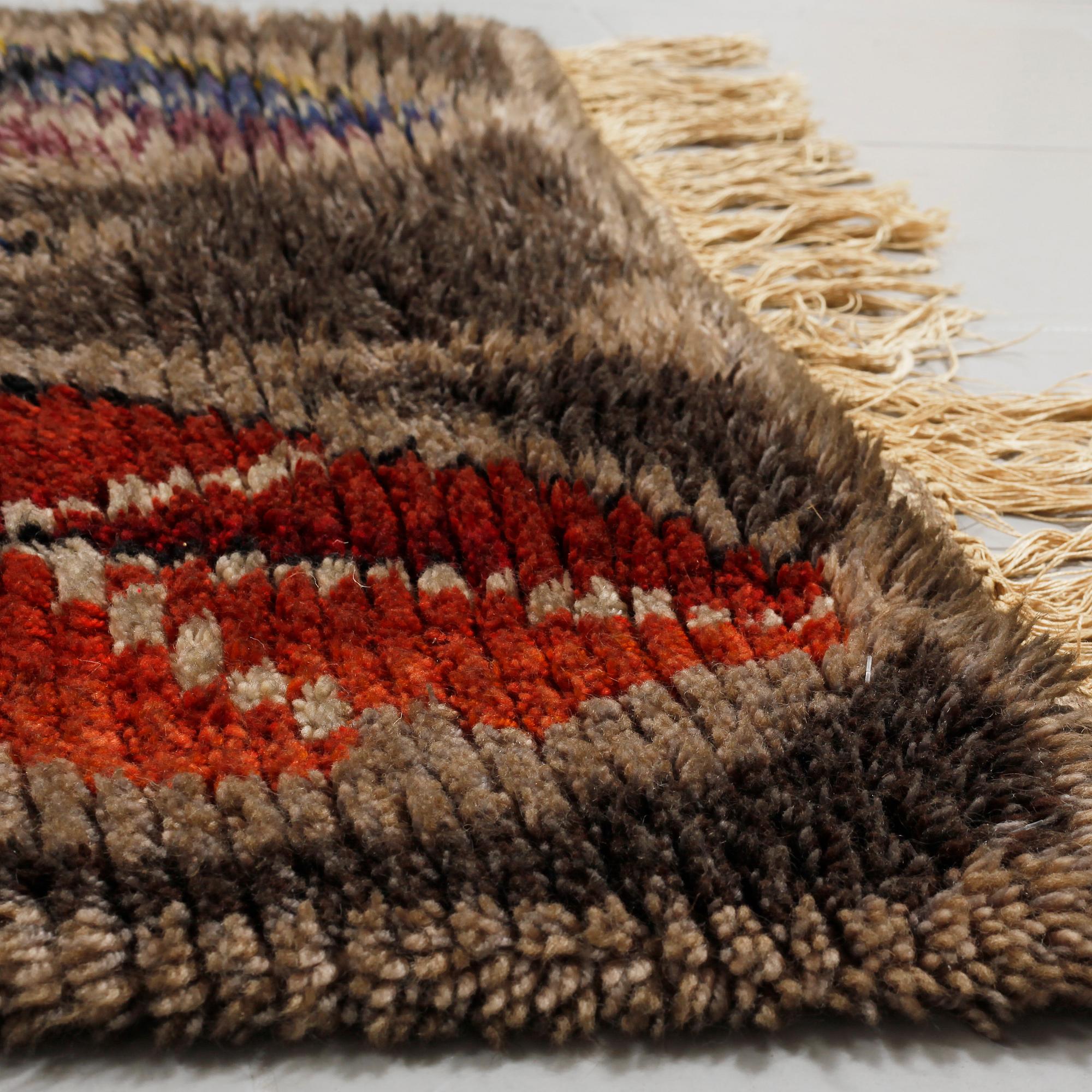 A hooked rug by Ingrid Johansson, second half of the 20th century, ca 150 x 100 cm.