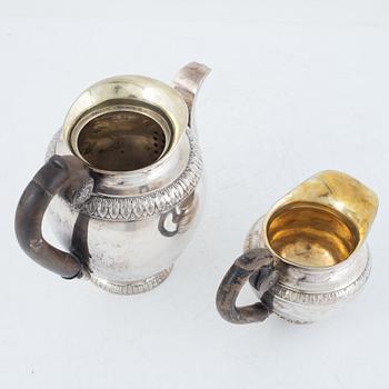 A Polish Silver Teapot and Creamer, Warsaw, 19th Century.