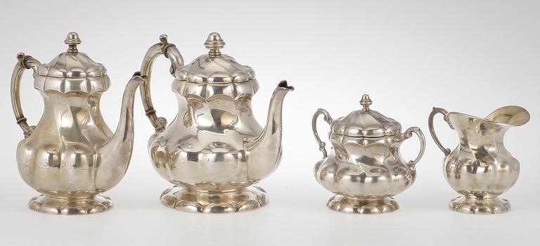 TE- samt KAFFESERVIS, 4 delar, silver, rokokostil,  USA, 1900-talets första hälft Tot vikt ca 2930 gram.