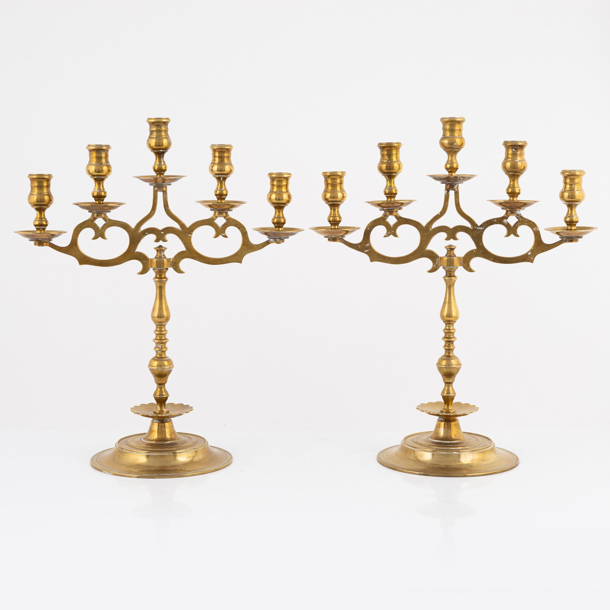 A pair of brass candelabras, early 20th century.